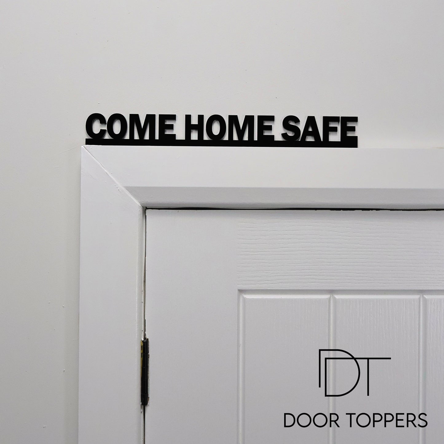 COME HOME SAFE Door Topper displayed above an interior doorway