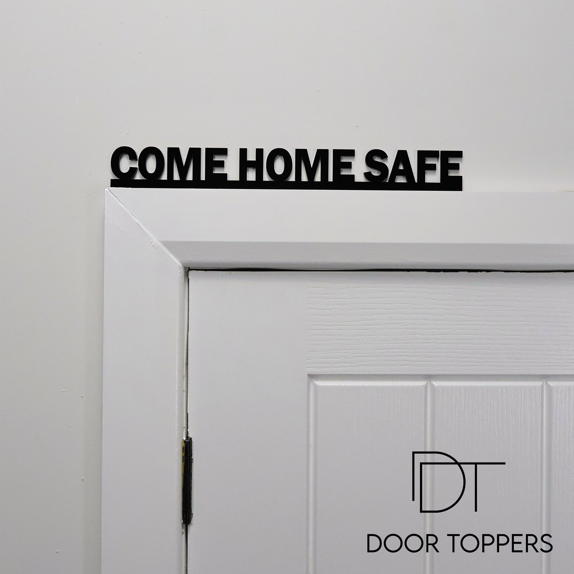 COME HOME SAFE Door Topper displayed above an interior doorway