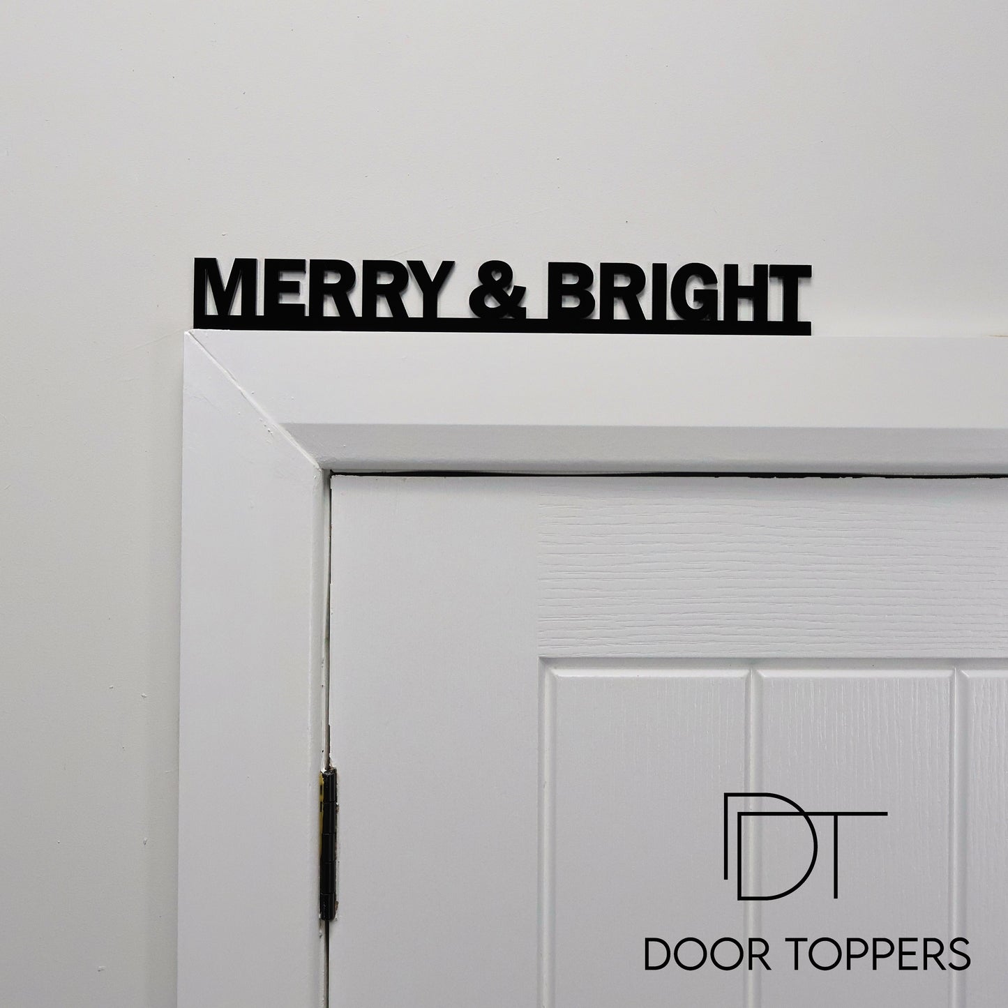 MERRY AND BRIGHT Door Topper - festive black acrylic wall sign handmade in the UK