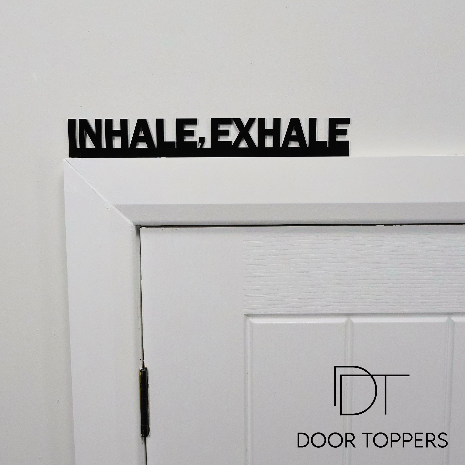 INHALE EXHALE mindfulness quote acrylic door topper sign displayed above a doorway