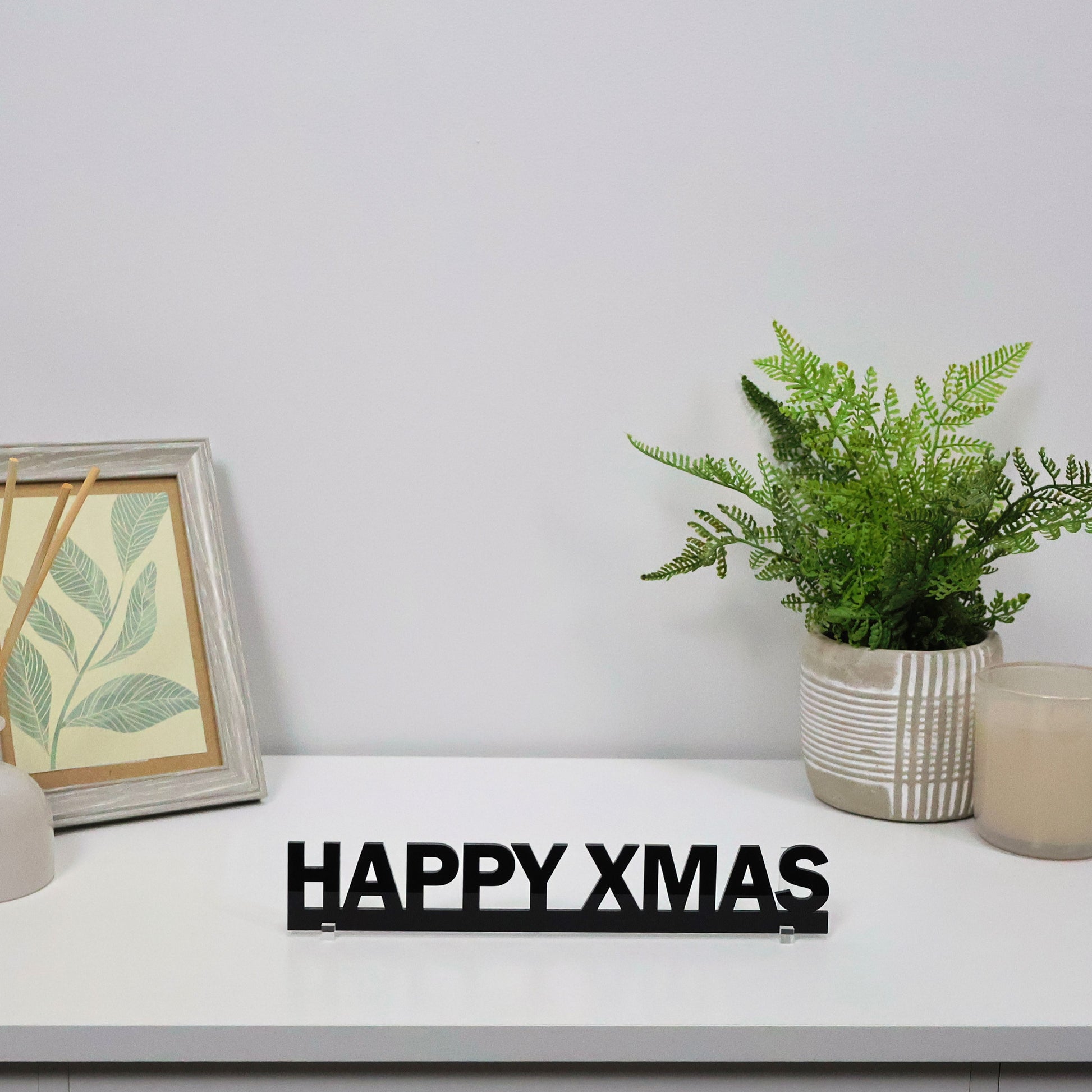 Gift-ready HAPPY XMAS Door Topper packaged for Christmas, ideal Secret Santa or festive gift.