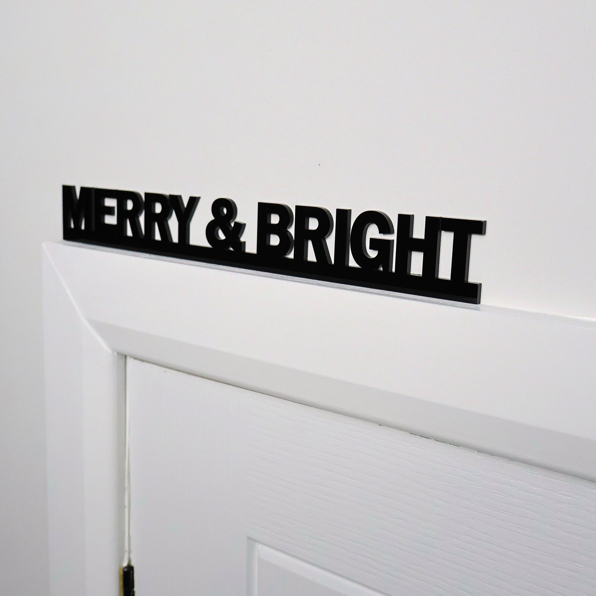 Side view showing sleek black acrylic sign thickness and finish