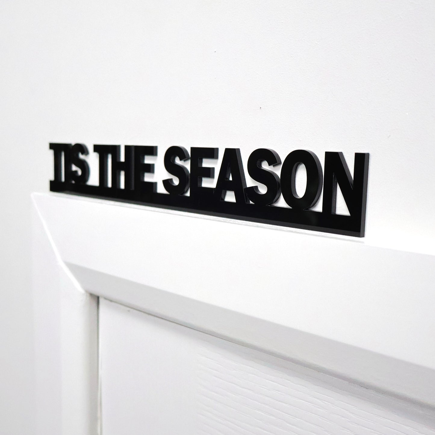 Side view showing lightweight acrylic design sitting on door frame