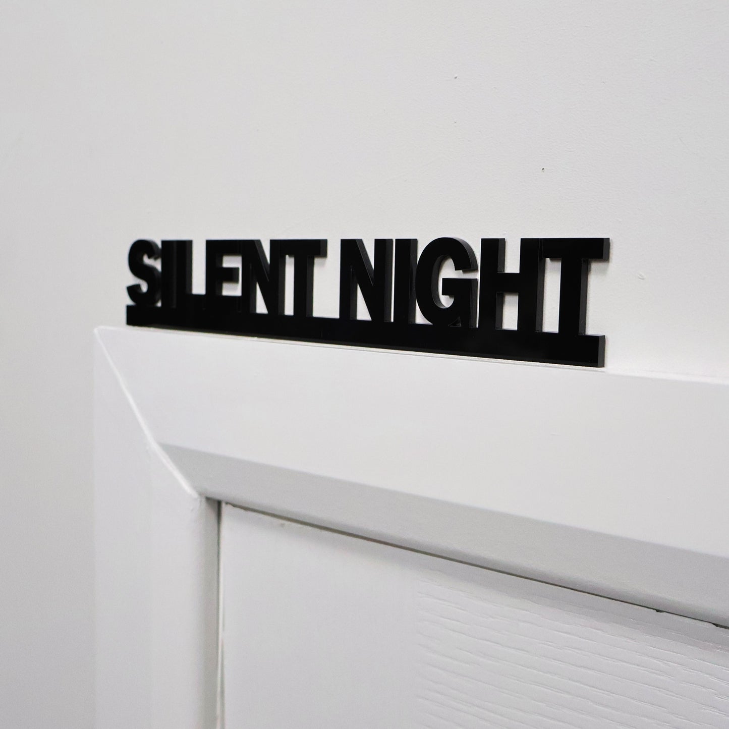 Side angle showing lightweight acrylic Door Topper on standard door frame