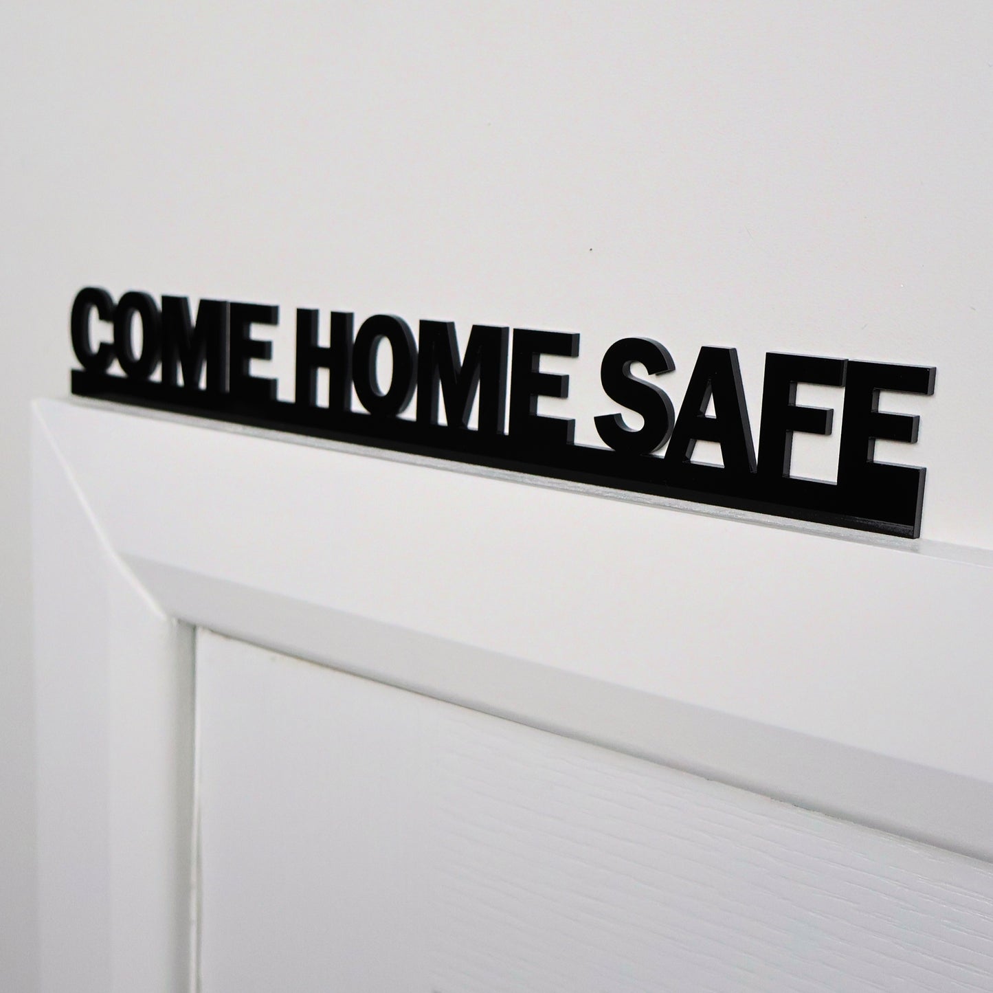 Door Topper balanced on top of a modern door frame