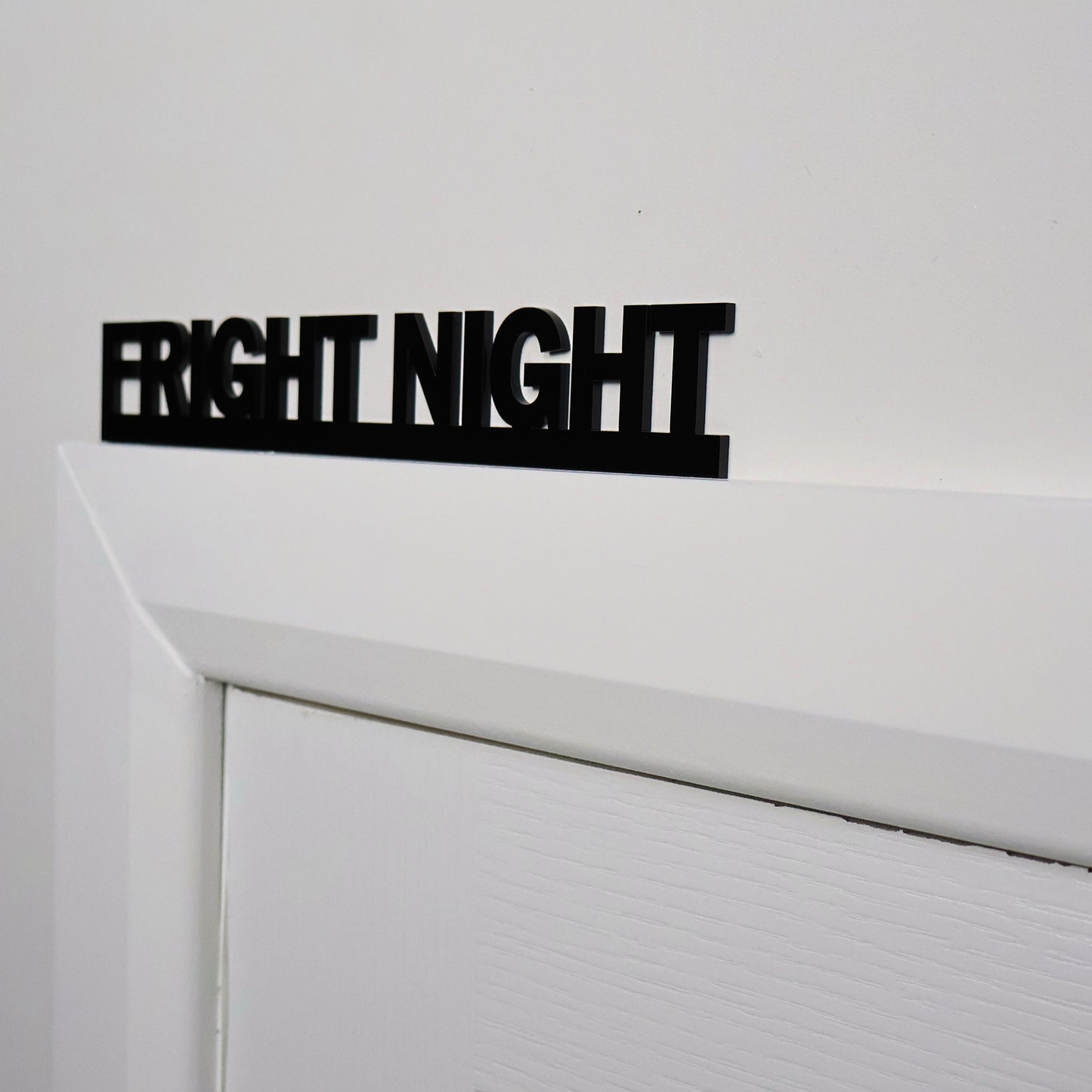 Close up of glossy black recycled acrylic finish