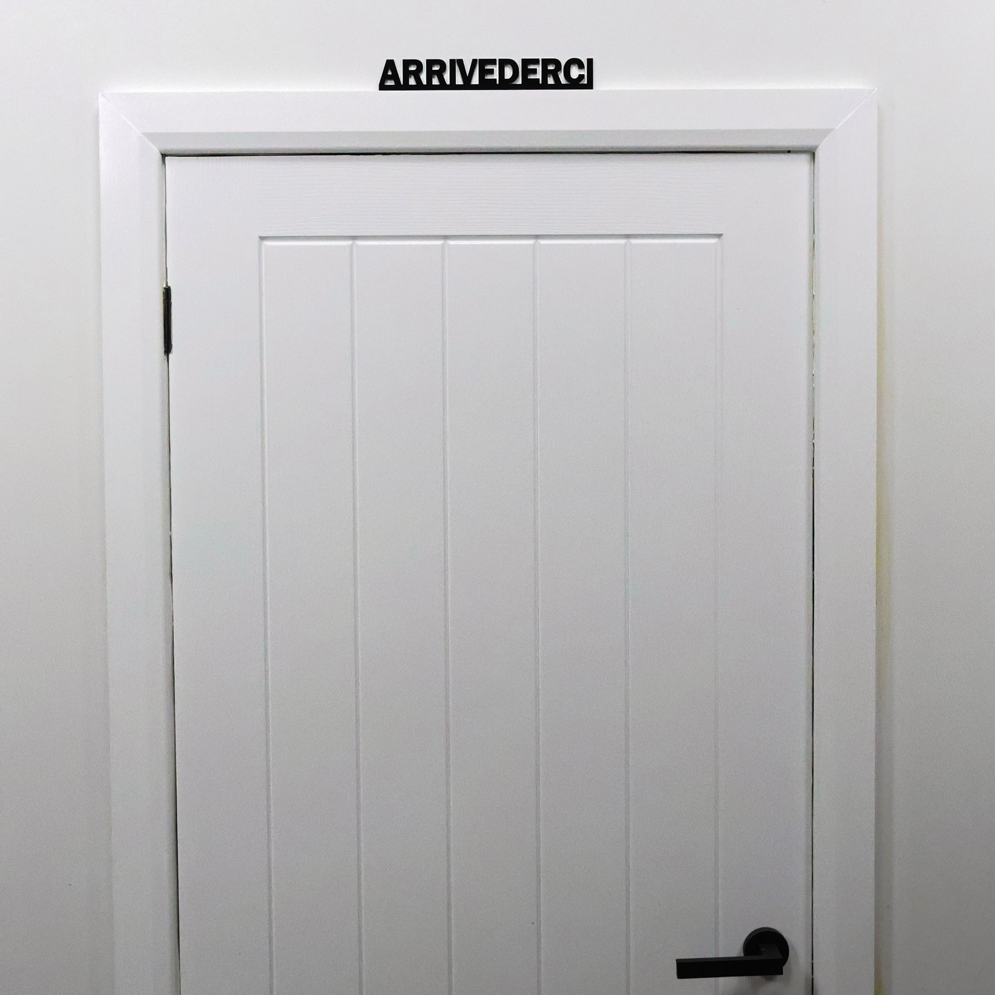 Modern Italian quote wall decor – stylish black acrylic farewell sign for hallways or offices.