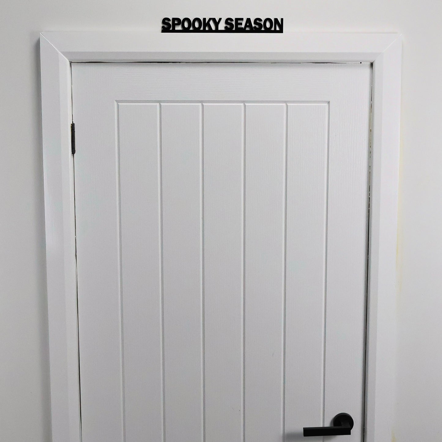 Modern recycled acrylic gothic decor with SPOOKY SEASON lettering
