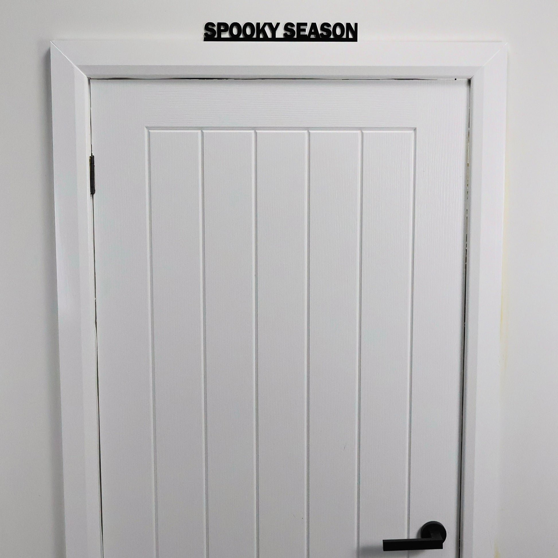 Modern recycled acrylic gothic decor with SPOOKY SEASON lettering