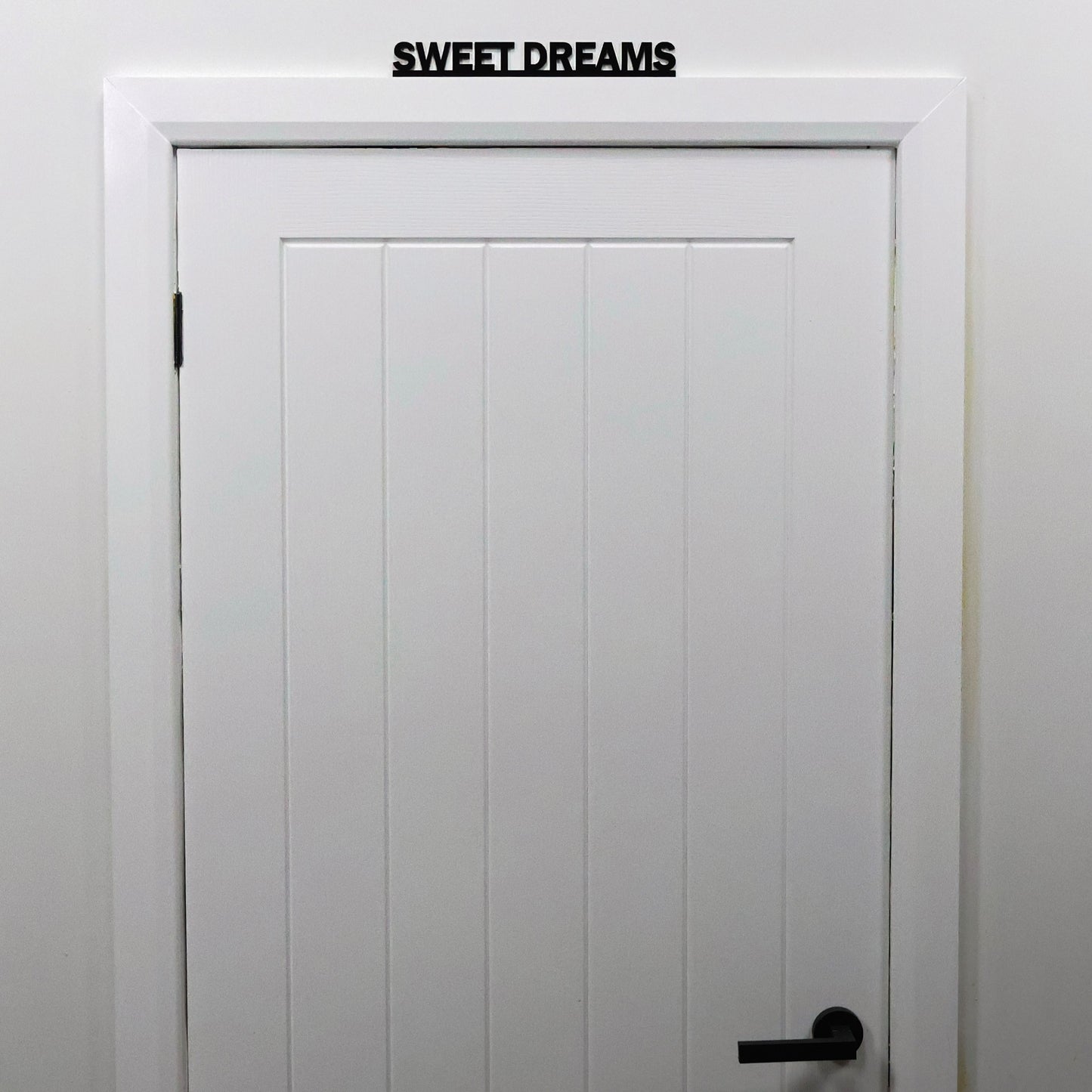 Interior styling with SWEET DREAMS Door Topper displayed in bedroom