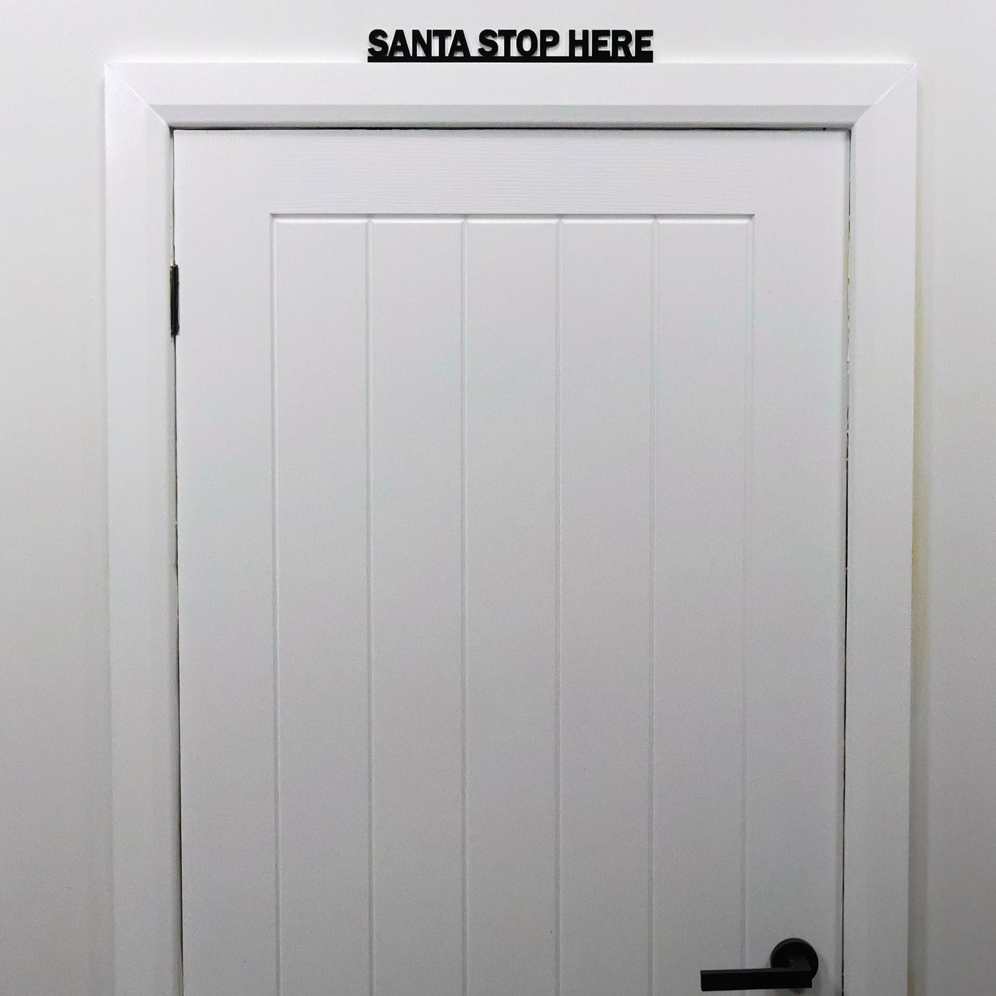 SANTA STOP HERE Door Topper - festive black acrylic wall sign handmade in the UK