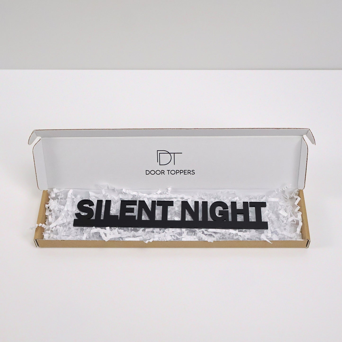 Eco friendly packaging for the SILENT NIGHT Door Topper handmade in the UK