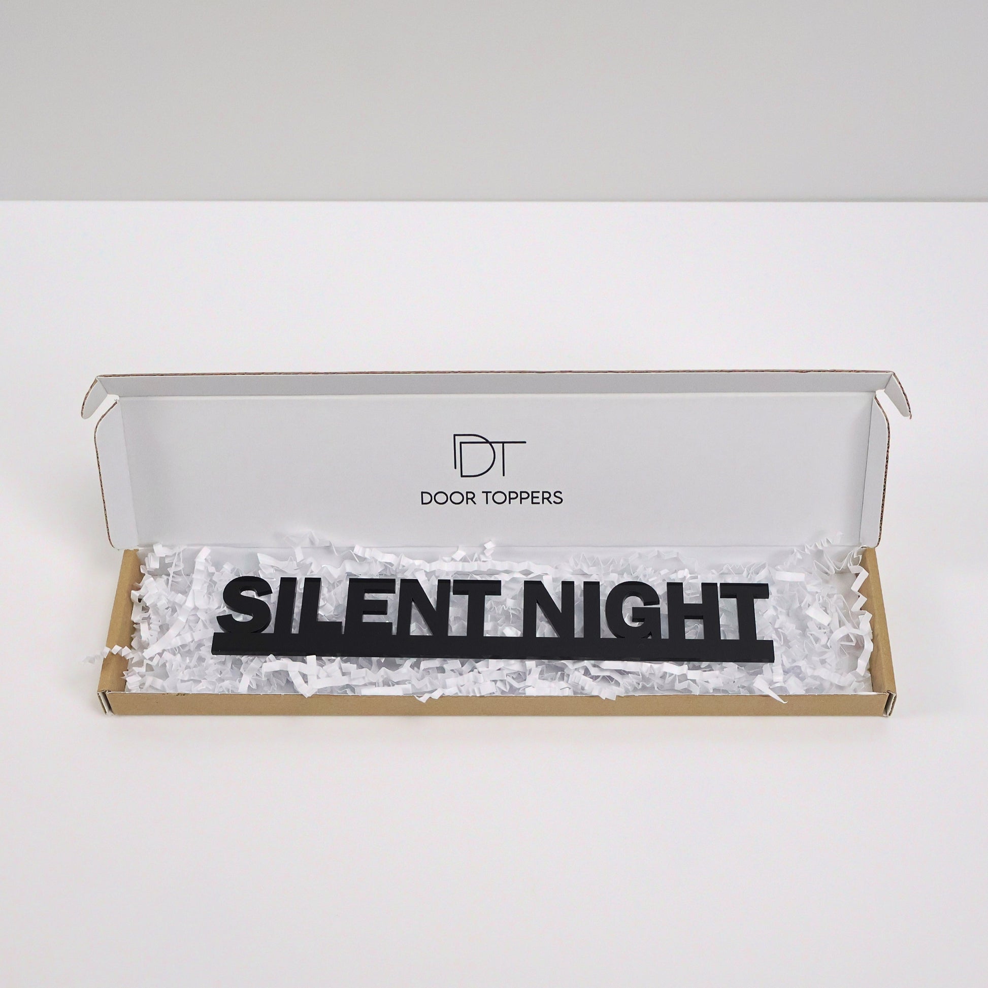 Eco friendly packaging for the SILENT NIGHT Door Topper handmade in the UK