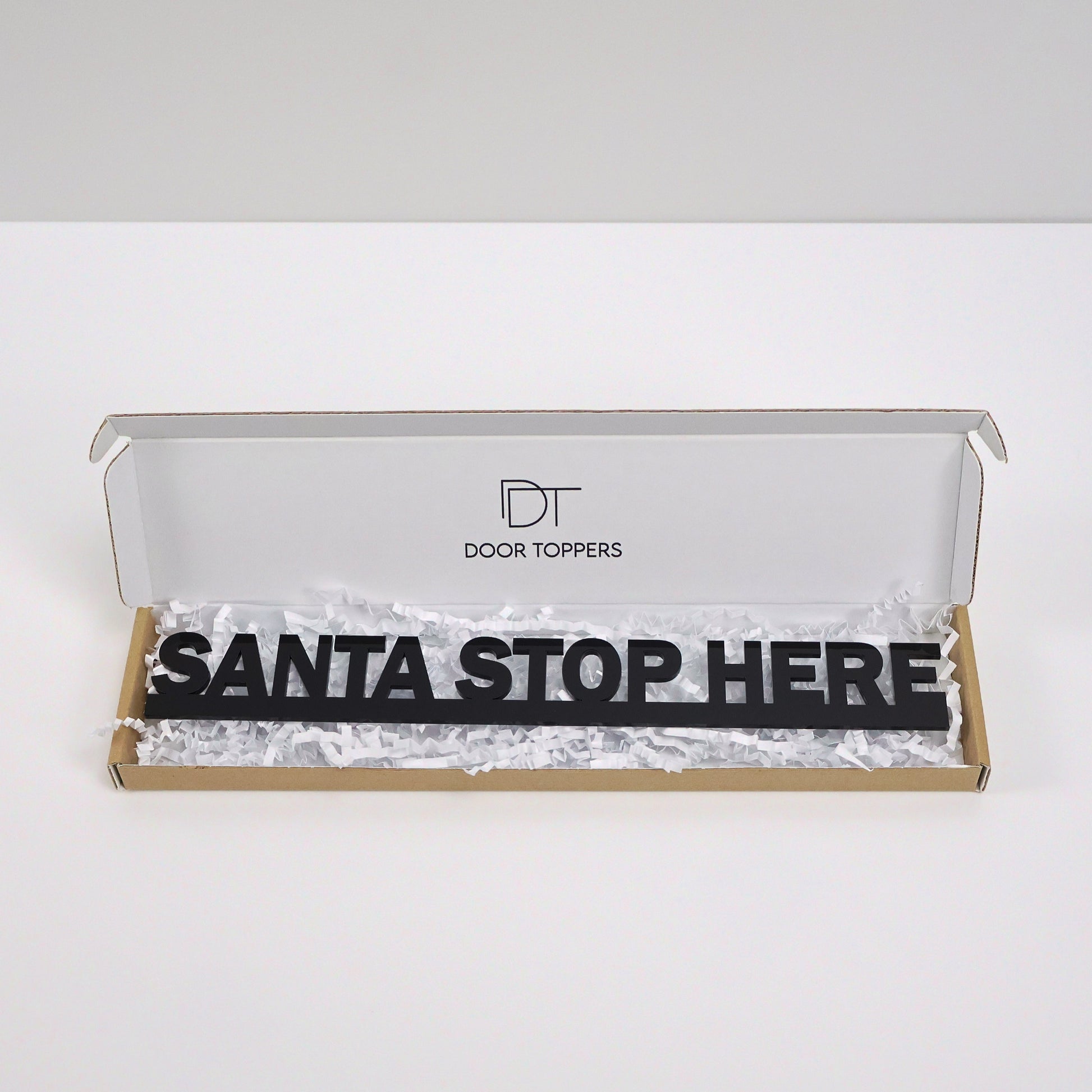 Gift-ready packaging for SANTA STOP HERE Door Topper – eco-friendly and festive