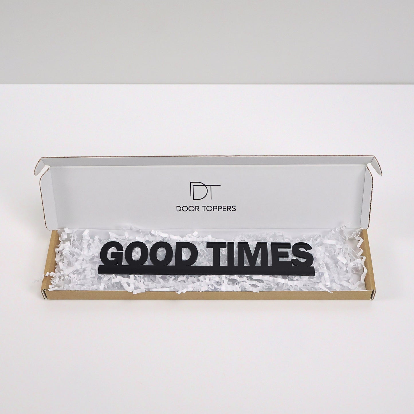 Gift-ready packaging for GOOD TIMES Door Topper – perfect birthday or housewarming gift