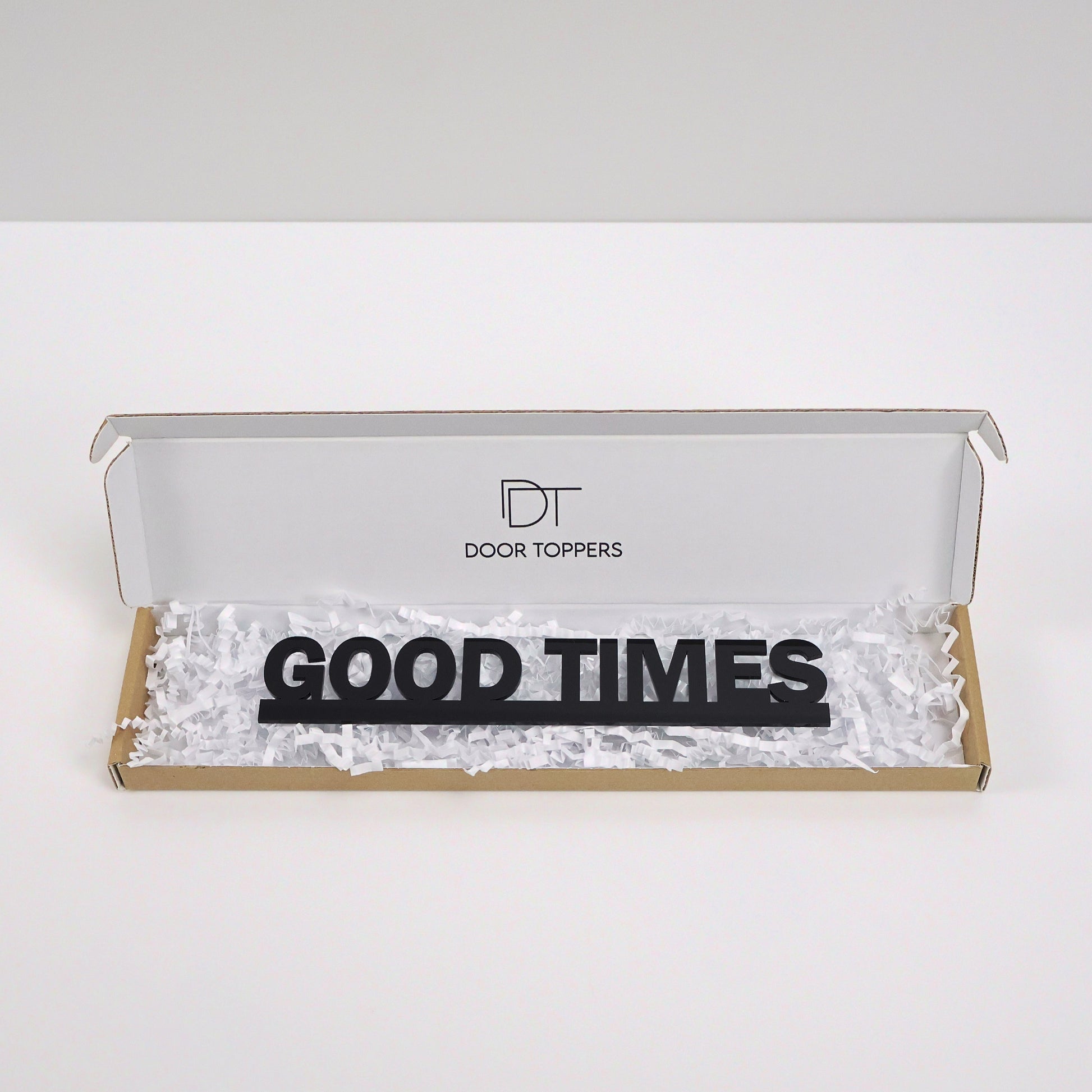 Gift-ready packaging for GOOD TIMES Door Topper – perfect birthday or housewarming gift