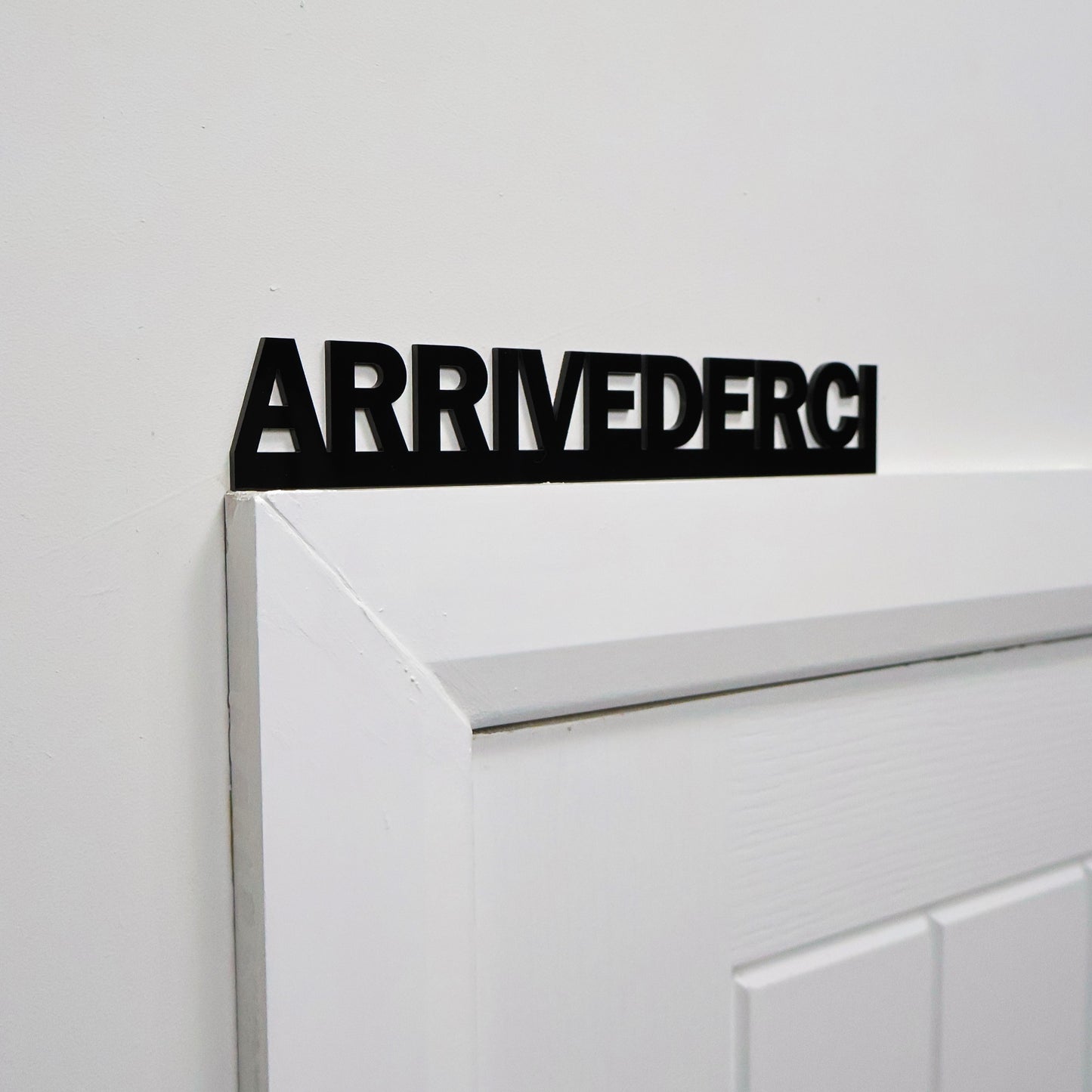 Italian farewell door topper shown on a standard white door frame.