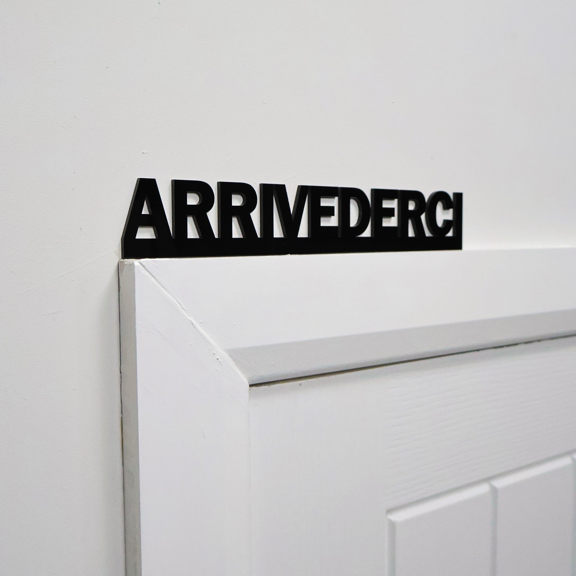 Italian farewell door topper shown on a standard white door frame.