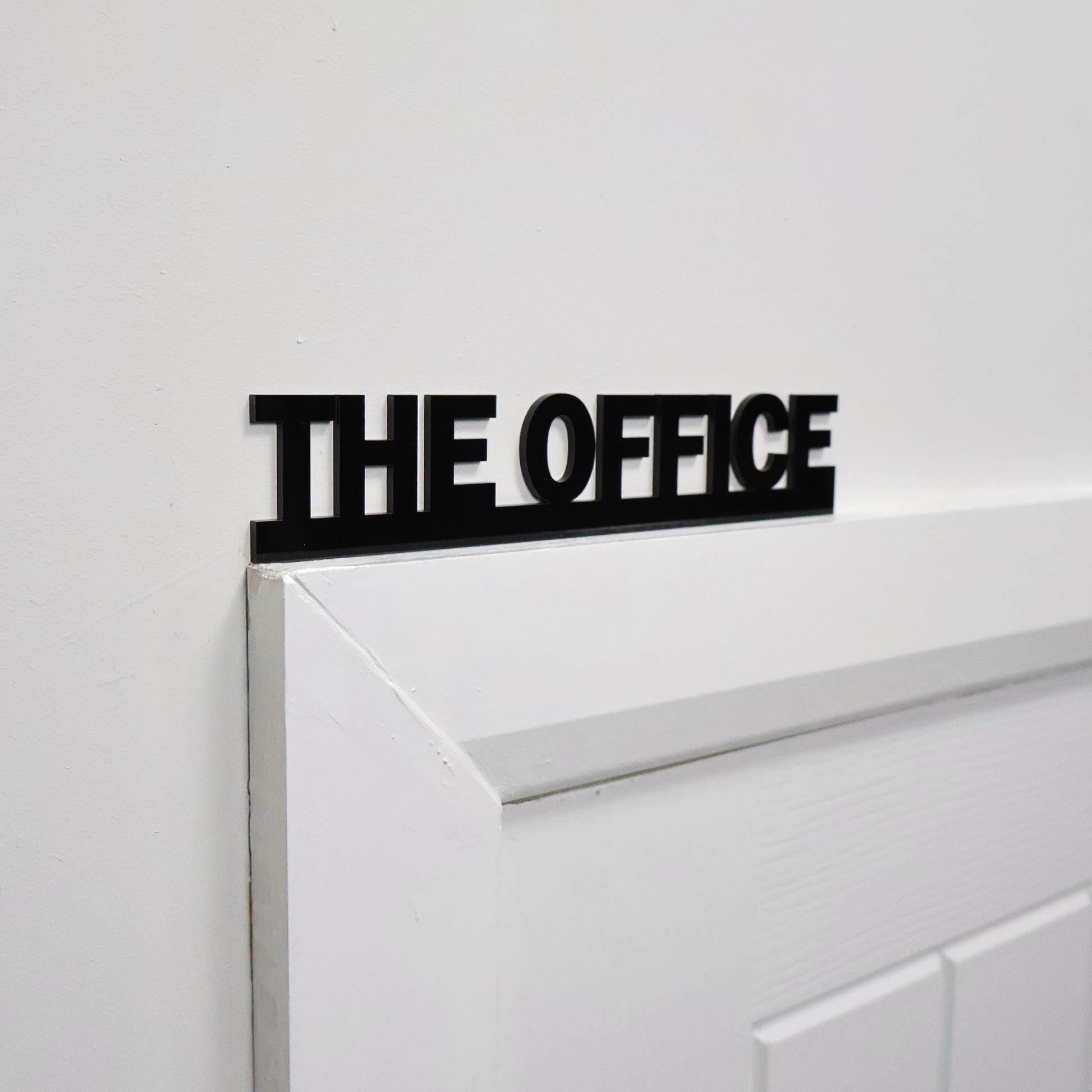 Side angle showing lightweight design sitting neatly on office doorway