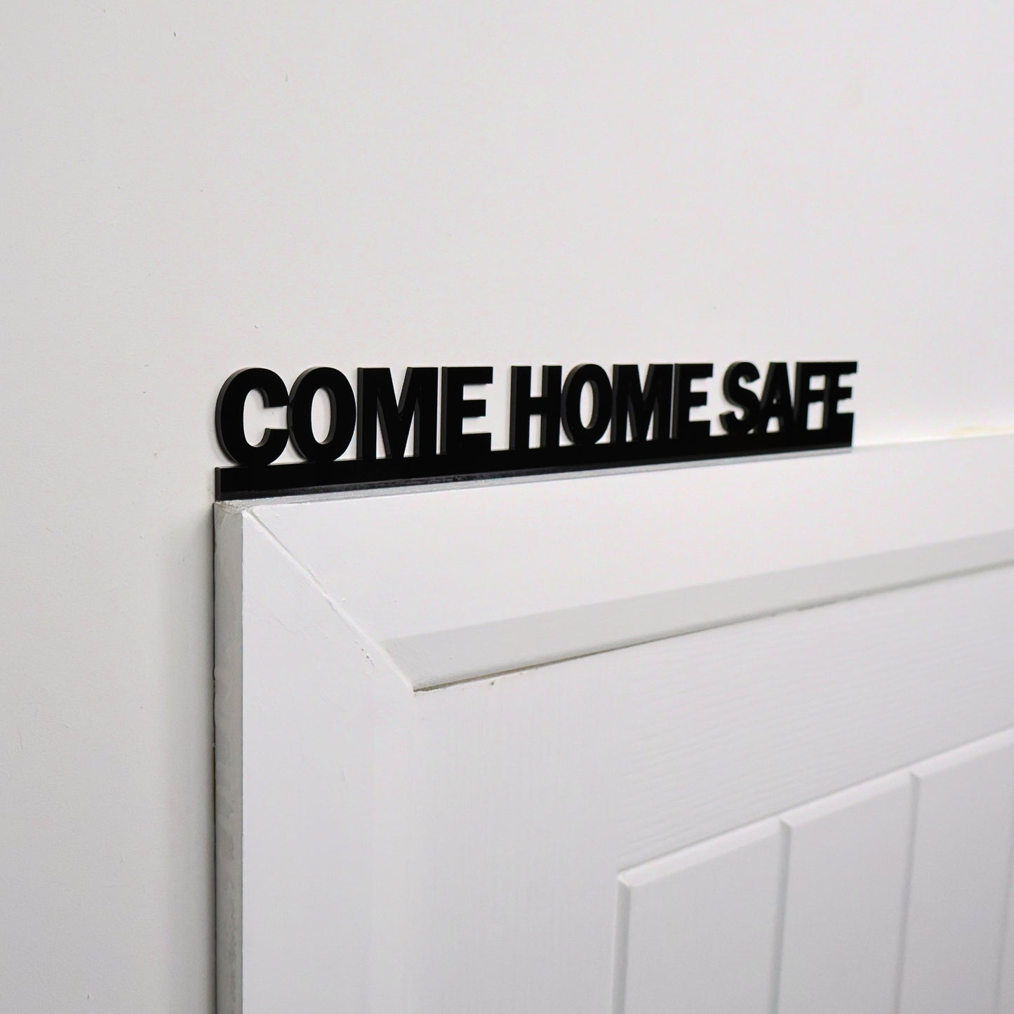 Close-up of glossy acrylic lettering and clean finish