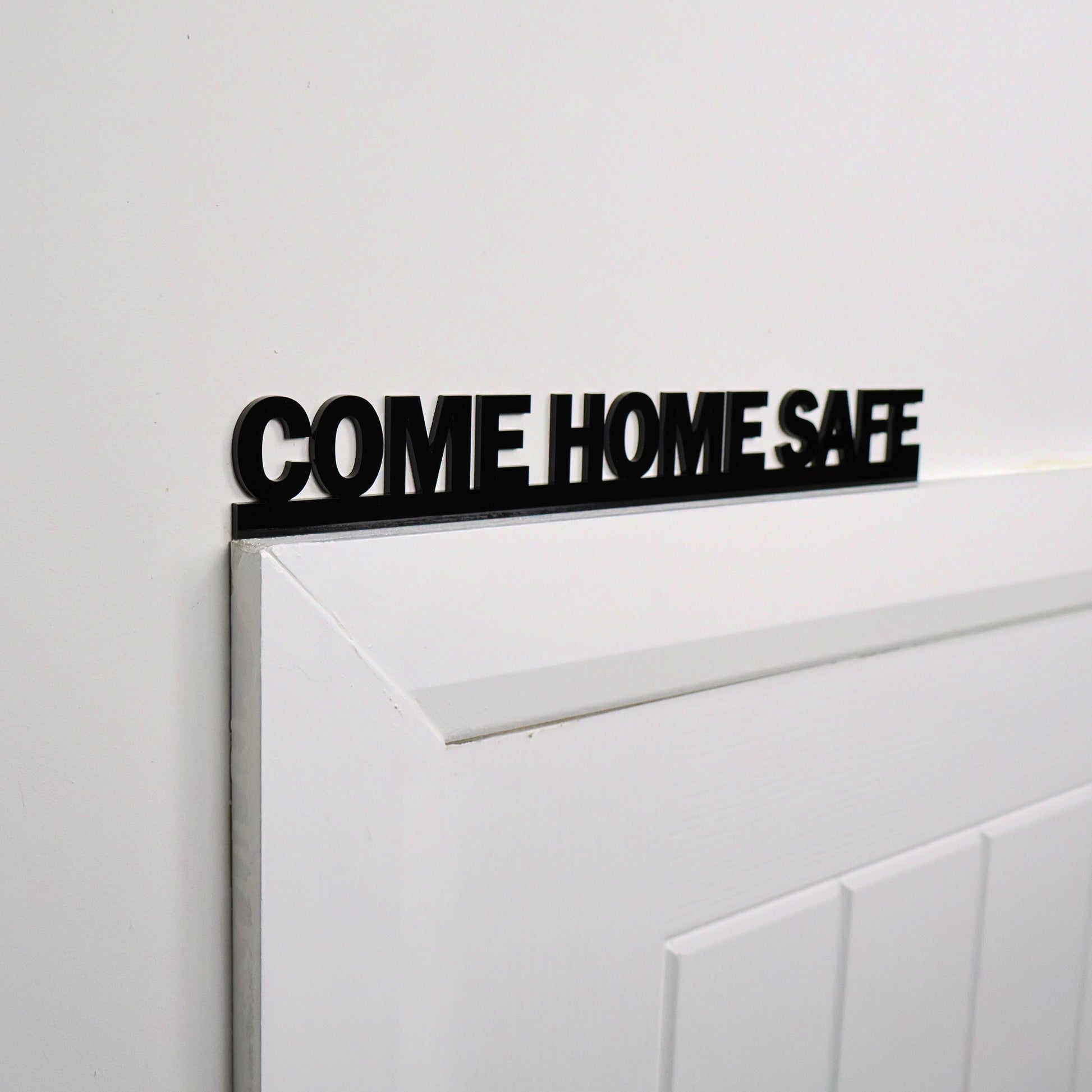 Close-up of glossy acrylic lettering and clean finish