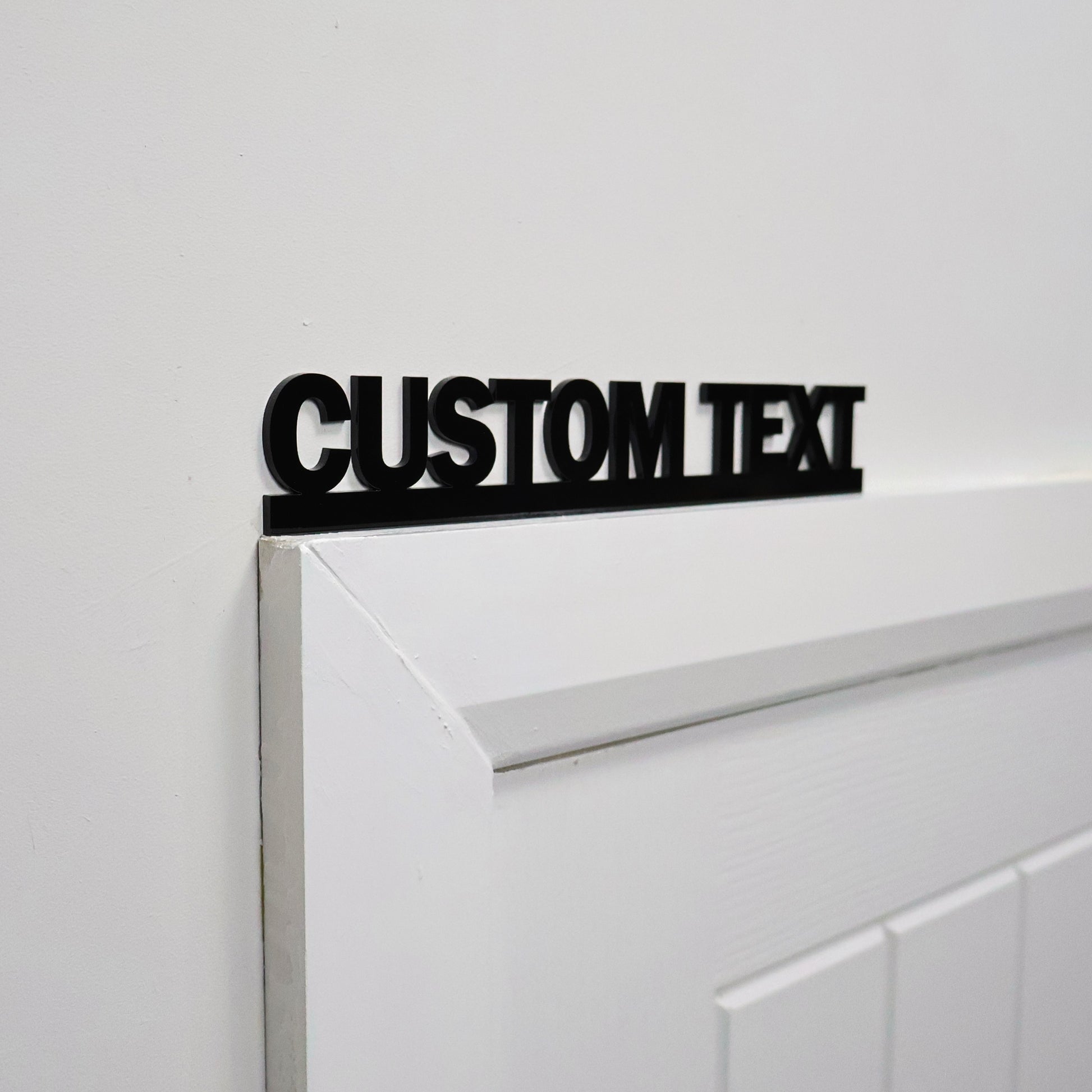 Detailed close-up of bespoke lettering on personalised door topper – handmade UK gift, perfect for birthdays, anniversaries or home decor lovers