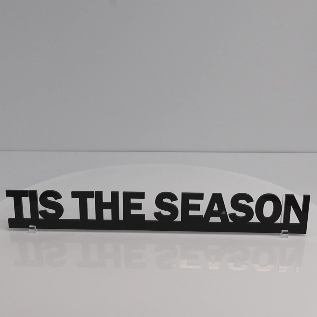 Close-up of glossy black acrylic lettering on the TIS THE SEASON Christmas Door Topper