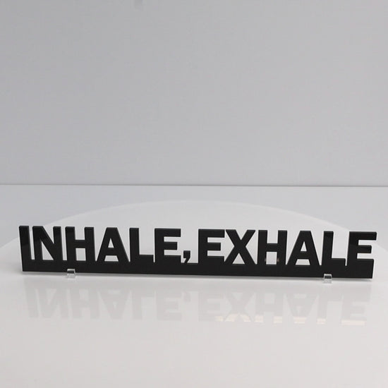 Rotating close-up video of INHALE EXHALE mindfulness quote door topper sign