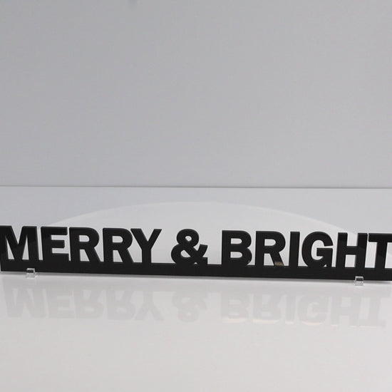 Flat lay of MERRY & BRIGHT Christmas Door Topper on white background