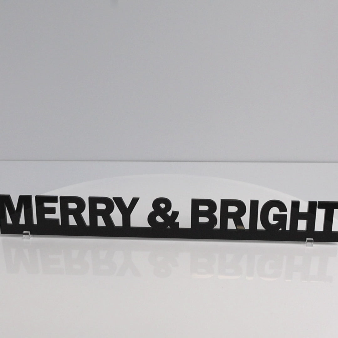 Flat lay of MERRY & BRIGHT Christmas Door Topper on white background