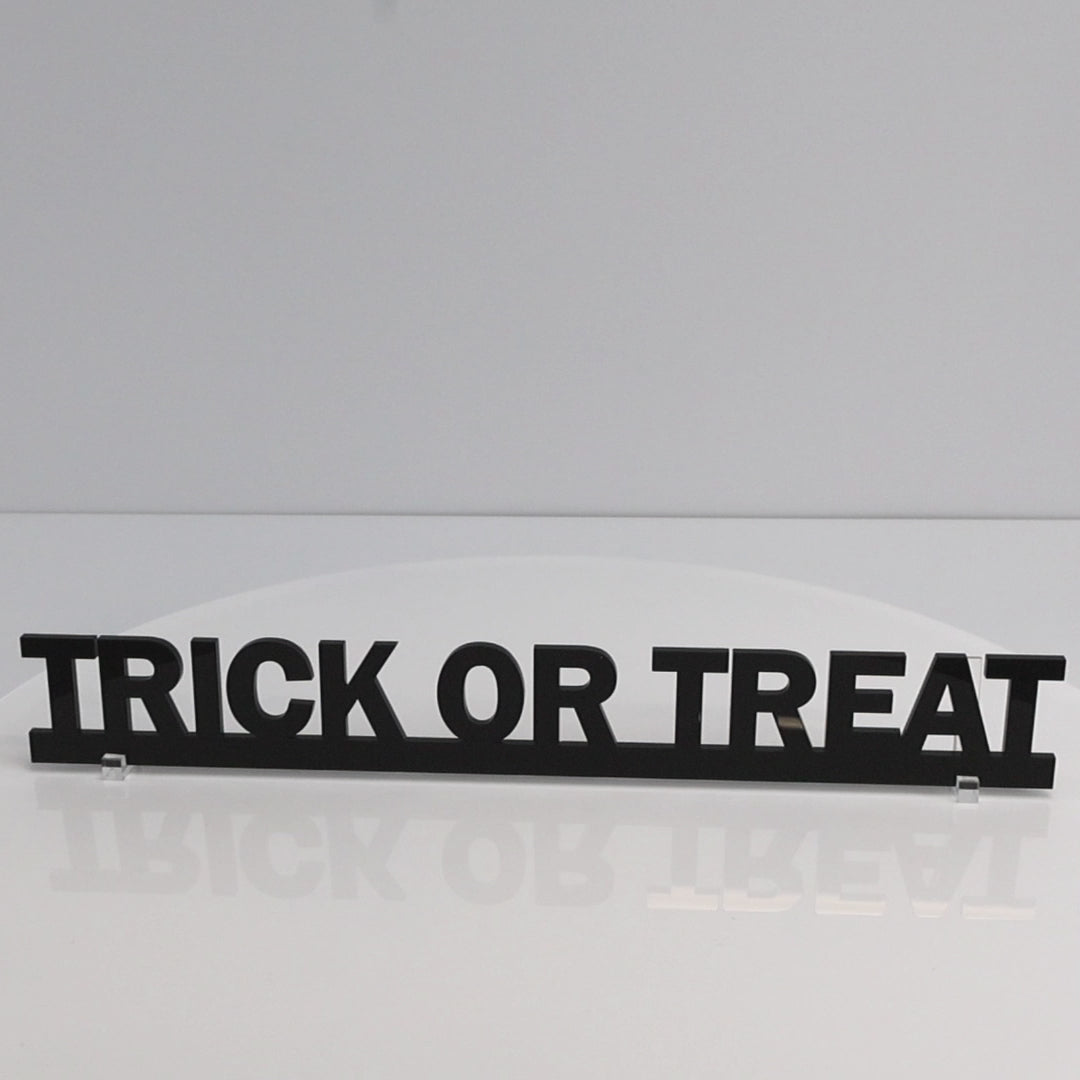 Modern black acrylic Halloween wall sign made in the UK
