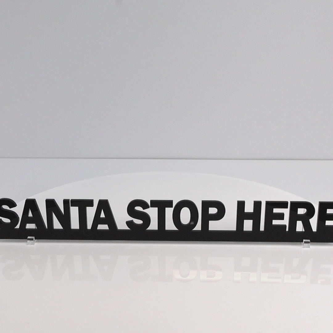 Handmade black acrylic Christmas wall sign made in the UK